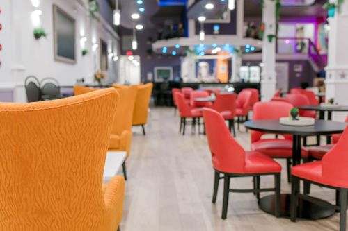 134 Main’s lounge interior with orange seating.