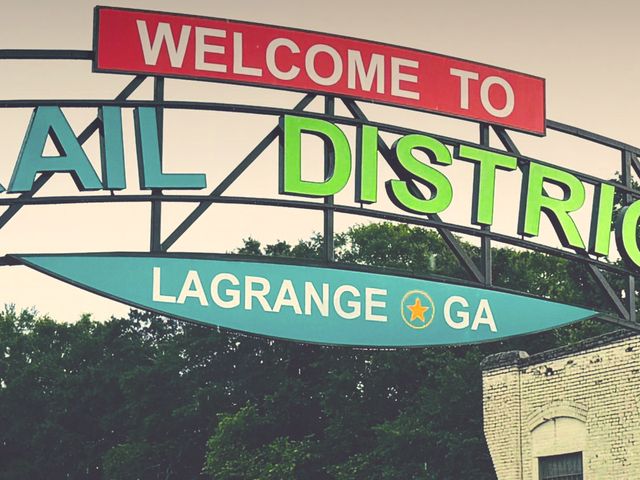 Rail District signage at dusk.